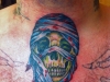 Crazy Skull Tattoo with bandana